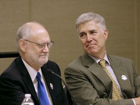 Associate Supreme Court Justice Neil Gorsuch, right, sits on a panel next to Sidney Thomas, Chief Judge of U.S. Court of Appeals for the Ninth Circuit, during a civics program showcase at the 2017 Ninth Circuit Judicial Conference in San Francisco, Monday, July 17, 2017. (AP Photo/Jeff Chiu, Pool)