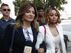 Blac Chyna and her attorney Lisa Bloom, left, arrive for a hearing seeking a restraining order against her former fiancee Rob Kardashian on Monday, July 10, 2017, in Los Angeles. Chyna has accused Kardashian of cyber bullying and domestic violence over a series of lurid Instagram posts he made last week. The posts got Kardashian's Instagram account shut down, but he continued his attacks on Twitter. (AP Photo/Jae C. Hong)