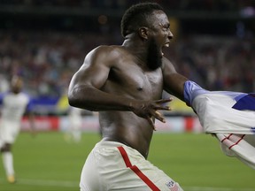 United States' Jozy Altidore celebrates after scoring against Costa Rica during a CONCACAF Gold Cup semifinal soccer match in Arlington, Texas, Saturday, July 22, 2017. (AP Photo/LM Otero)