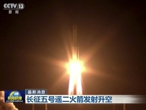 In this image taken from video footage run by China's CCTV via AP Video, a Long March 5 rocket lifts off from the Wenchang Space Launch Center in southern China's Hainan province on Sunday, July 2, 2017. Authorities say the Long March-5 Y2 launched Sunday had an abnormality during the flight after what appeared to be a successful liftoff. The failure of the Long March 5 rocket deals a rare setback to China's highly successful space program, one that will almost certainly delay plans to send a spacecraft to bring back samples from the moon later this year, along with other upcoming missions. Chinese characters at both reads "Long March-5 Y2 rocket life off." (CCTV via AP Video)