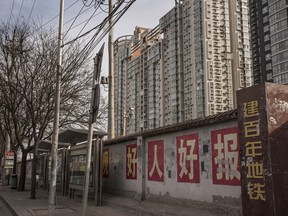The building where Guan Jun, one of the world’s richest men, lives in Beijing, Jan. 29, 2017