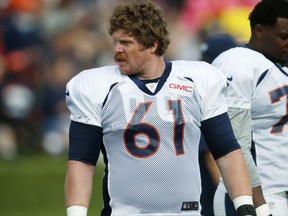 FILE - In this Thursday, Aug. 4, 2016, file photograph, Denver Broncos center Matt Paradis takes part in drills during the team's NFL football training camp in Englewood, Colo. The Broncos' star center, who missed the entire offseason training regimen following surgeries on both hips, says that he does not recall feeling this healthy heading into a fall training camp, which begins Wednesday. (AP Photo/David Zalubowski, file)