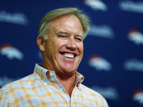 FILE - In this Monday, April 24, 2017, file photo, John Elway, general manager of the Denver Broncos, talks about the football team's plans in the upcoming NFL draft during a news conference in Englewood, Colo. Elway has signed a five-year contract extension on Monday, July 24, 2017, to continue on as the team's GM. (AP Photo/David Zalubowski, File)