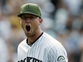 Colorado Rockies pitcher Kyle Freeland reacts after striking out Chicago White Sox's Willy Garcia to end the top of the eighth inning of a baseball game Sunday, July 9, 2017, in Denver. (AP Photo/David Zalubowski)
