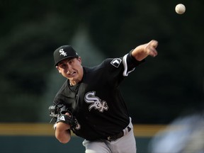 Chicago White Sox starting pitcher Derek Holland (45) pitches to the Colorado Rockies during the first inning of a baseball game Friday, July 7, 2017, in Denver. (AP Photo/Joe Mahoney)