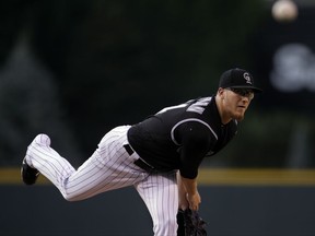 CORRECTS TO SATURDAY NOT FRIDAY - Colorado Rockies starting pitcher Jeff Hoffman delivers against the Chicago White Sox in the first inning of a baseball game Saturday, July 8, 2017, in Denver.(AP Photo/Joe Mahoney)