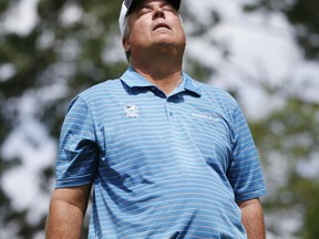 CORRECTS DATE  - Kenny Perry reacts after missing a putt on the third hole during the third round of the U.S. Senior Open golf tournament, Saturday, July 1, 2017, in Peabody, Mass. (AP Photo/Michael Dwyer)