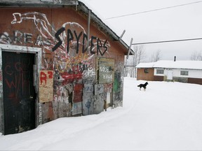 An abandoned house is shown on the Pikangikum First Nation on Friday, January 5, 2007. Ontario Health Minister Eric Hoskins is announcing funding for 20 full-time mental health workers for Pikangikum First Nation â€" a remote community struggling with a suicide crisis and pressing mental health needs from about 380 people seeking counselling. THE CANADIAN PRESS/John Woods