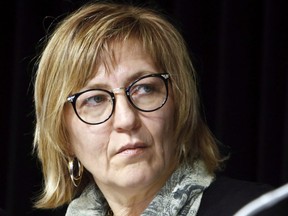 Marilyn Poitras, one of the commissioners of the National Inquiry into Missing and Murdered Indigenous Women and Girls, takes part in a news conference in Ottawa on Tuesday, February 7, 2017. The inquiry into missing and murdered Indigenous women says Poitras has resigned as a commissioner. THE CANADIAN PRESS/Fred Chartrand