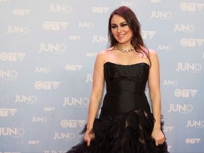 Tanya Tagaq poses on the red carpet during the 2015 Juno Awards in Hamilton, Ont., on Sunday, March 15, 2015. An array of mainstream artists, Indigenous acts and rising stars comprise this year's slate of Polaris Music Prize nominees. THE CANADIAN PRESS/Peter Power