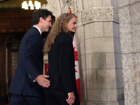 Prime Minister Justin Trudeau walks with Julie Payette on Parliament Hill in Ottawa, Thursday July 13, 2017. Trudeau says there was nothing that came up during the vetting of Julie Payette that he saw as a reason she shouldn't be Canada's next Governor General. THE CANADIAN PRESS/Fred Chartrand