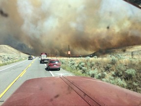 Smoke fills the sky as a wildfire burns in Ashcroft, B.C.