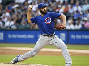 Chicago Cubs starting pitcher Jake Arrieta delivers during the first inning of the team's baseball game against the Chicago White Sox on Wednesday, July 26, 2017, in Chicago. (AP Photo/Charles Rex Arbogast)