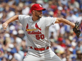 St. Louis Cardinals starting pitcher Adam Wainwright delivers against the Chicago Cubs during the first inning of a baseball game, Saturday, July 22, 2017, in Chicago. (AP Photo/Kamil Krzaczynski)