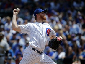 Chicago Cubs starting pitcher Eddie Butler delivers during the first inning of a baseball game against the Pittsburgh Pirates Friday, July 7, 2017, in Chicago. (AP Photo/Charles Rex Arbogast)