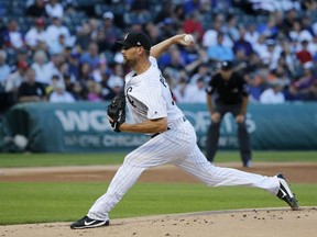 Chicago White Sox starting pitcher Mike Pelfrey delivers during the first inning of the team's baseball game against the Chicago Cubs on Thursday, July 27, 2017, in Chicago. (AP Photo/Charles Rex Arbogast)