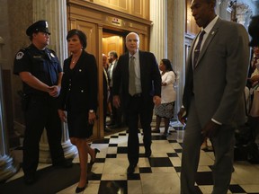 Sen. John McCain, R-Ariz. arrive on Capitol Hill in Washington, Tuesday, July 25, 2017, as the Senate was to vote on moving head on health care with the goal of erasing much of Barack Obama's law.  (AP Photo/Andrew Harnik)