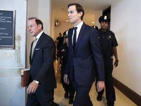 White House adviser Jared Kushner, center, and his attorney Abbe Lowell, left, arrive on Capitol Hill in Washington, Tuesday, July 25, 2017, to be interviewed behind closed doors by the House Intelligence Committee. (AP Photo/Jacquelyn Martin)