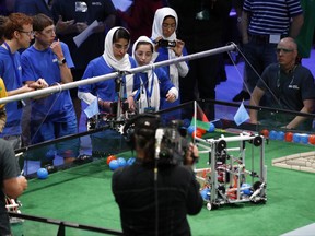 The Afghanistan girls team competes in the First Global Robotics Challenge, Monday, July 17, 2017, in Washington. The challenge is an international robotics event with teams from over 100 countries. (AP Photo/Jacquelyn Martin)