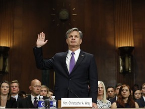 FBI Director nominee Christopher Wray is sworn-in on Capitol Hill in Washington, Wednesday, July 12, 2017, prior to testifying at his confirmation hearing before the Senate Judiciary Committee. (AP Photo/Pablo Martinez Monsivais)
