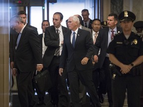 Vice President Mike Pence arrives on Capitol Hill in Washington, Thursday, July 13, 2017, to meet with lawmakers on the Republican health care bill which is under attack from within the party. (AP Photo/J. Scott Applewhite)