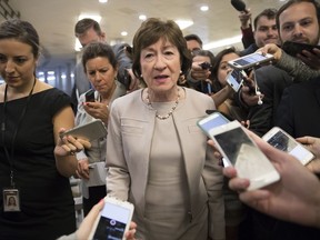 Sen. Susan Collins, R-Maine is surrounded by reporters as she arrives on Capitol Hill in Washington, Tuesday, July 25, 2017, before a test vote on the Republican health care bill. The bill has faced opposition and challenges within the Republican ranks, including by Collins. (AP Photo/J. Scott Applewhite)