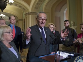 Seate Minority Leader Chuck Schumer, D-N.Y., joined from left by, Sen. Patty Murray, D-Wash., Sen. Dick Durbin, D-Ill., Sen. Ron Wyden, D-Ore., and Sen. Debbie Stabenow, D-Mich., speaks with reporters outside the chamber after Vice President Mike Pence broke a 50-50 tie to start debating Republican legislation to tear down much of the Obama health care law, on Capitol Hill in Washington, Tuesday, July 25, 2017. (AP Photo/J. Scott Applewhite)
