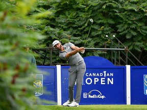 Dustin Johnson of the United States plays his shot from the 16th tee during the second round of the RBC Canadian Open at Glen Abbey Golf Club on July 28, 2017 in Oakville, Canada.