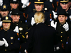 President Donald Trump looks to police officers behind him as he speaks about law enforcement issues on July 28, 2017 in Brentwood, New York.