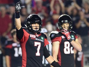 Redblacks quarterback Trevor Harris salutes the crowd following their win over the Montreal Alouettes 24-19 in CFL action in Ottawa on Wednesday night.