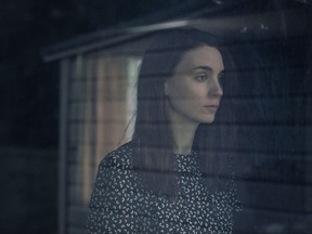 This image released by A24 shows Rooney Mara in a scene from the film, "A Ghost Story." (Bret Curry/A24 via AP)