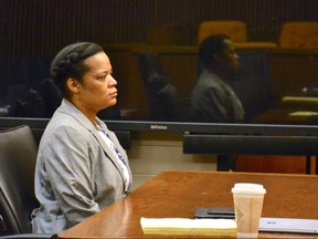 In this undated photo, Uloma Curry-Walker appears at a hearing last month in Cuyahoga County Common Pleas Court in Cleveland. Curry-Walker, 45, a newlywed accused of soliciting her firefighter husband's killing to collect $100,000 in insurance money has been convicted Friday, July 7, 2017, of aggravated murder in a scheme that was flawed from the start: His ex-wife was still the beneficiary of his policy. Sentencing is scheduled for Aug. 8.