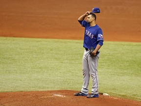 Texas Rangers starting pitcher Tyson Ross reacts after giving up a two-run double to Tampa Bay Rays' Mallex Smith during the fourth inning of a baseball game Sunday, July 23, 2017, in St. Petersburg, Fla. (AP Photo/Mike Carlson)