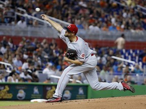 Cincinnati Reds' Tim Adleman pitches during the first inning of a baseball game against the Miami Marlins, Saturday, July 29, 2017, in Miami. (AP Photo/Wilfredo Lee)