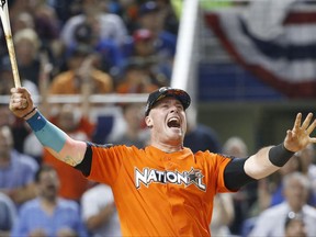 Miami Marlins' Justin Bour reacts as he competes during the MLB baseball All-Star Home Run Derby, Monday, July 10, 2017, in Miami. (AP Photo/Wilfredo Lee)