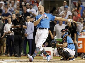 New York Yankees' Aaron Judge smiles as he competes during the MLB baseball All-Star Home Run Derby, Monday, July 10, 2017, in Miami.