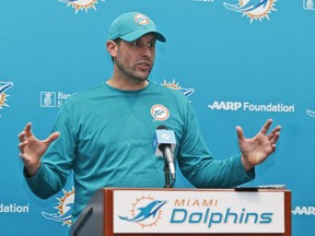Miami Dolphins head coach Adam Gase gestures as he speaks during a news conference, Tuesday, July 25, 2017, at the Dolphins training facility in Davie, Fla. Gase believes his roster is more talented than a year ago when he was a rookie coach for the Dolphins, who start training camp Thursday. (AP Photo/Wilfredo Lee)