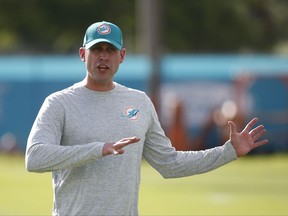 Miami Dolphins head coach Adam Gase talks to players during an NFL football training camp, Thursday, July 27, 2017 at the Dolphins training facility in Davie, Fla. (AP Photo/Wilfredo Lee)