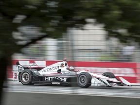 Helio Castroneves zooms around the track on his way to the fastest time in the first practice session for the Toronto Indy on Friday July 14, 2017. THE CANADIAN PRESS/Frank Gunn