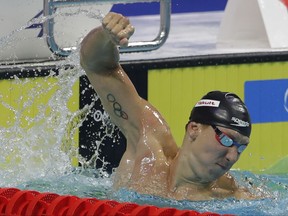 United States' Chase Kalisz celebrates after winning the gold medal in the men's 200-meter individual medley final during the swimming competitions of the World Aquatics Championships in Budapest, Hungary, Thursday, July 27, 2017. (AP Photo/Petr David Josek)