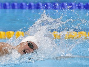 United States' Katie Ledecky competes in a a women's 400-meter freestyle heat during the swimming competitions of the World Aquatics Championships in Budapest, Hungary, Sunday, July 23, 2017. (AP Photo/Darko Bandic)