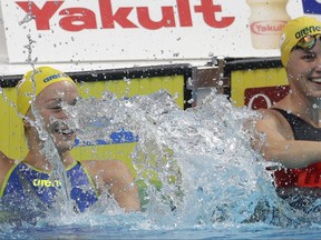Sweden's Sarah Sjostrom celebrates after setting a new world record in a women's 50-meter freestyle semifinal during the swimming competitions of the World Aquatics Championships in Budapest, Hungary, Saturday, July 29, 2017. (AP Photo/Petr David Josek)