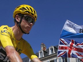 Britain's Chris Froome arrives for the start of the sixth stage of the Tour de France cycling race over 216 kilometers (134 miles) with start in Vesoul and finish in Troyes, France, Thursday, July 6, 2017. (AP Photo/Peter Dejong)