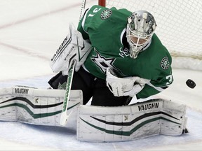 FILE - In this Dec. 29, 2016, file photo, Dallas Stars goalie Antti Niemi (31) blocks a shot on goal during the third period of an NHL hockey game against the Colorado Avalanche in Dallas. The Stanley Cup champion Pittsburgh Penguins will look a lot different as they go for a three-peat. The Penguins signed defenseman Matt Hunwick and goaltender Antti Niemi and lost defensemen Trevor Daley and Ron Hainsey and center Nick Bonino on the first day of free agency on Saturday, July 1, 2017.  (AP Photo/LM Otero, File)