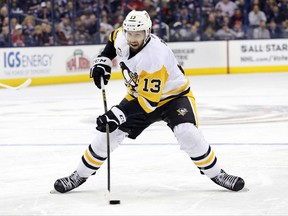 FILE - In this Dec. 22, 2016, file photo, Pittsburgh Penguins' Nick Bonino plays against the Columbus Blue Jackets during an NHL hockey game in Columbus, Ohio. The Western Conference-champion Nashville Predators took care of an area of concern, signing center Nick Bonino away from the Stanley Cup champion Penguins with a $16.4 million, four-year contract on Saturday, July 1, 2017. (AP Photo/Jay LaPrete, File)