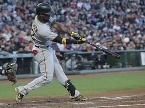Pittsburgh Pirates' Andrew McCutchen hits a three-run home run off of San Francisco Giants pitcher Matt Cain during the second inning of a baseball game in San Francisco, Monday, July 24, 2017. (AP Photo/Jeff Chiu)