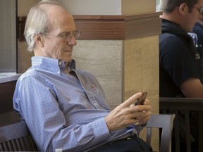 Midnight Rider star actor William Hurt waits outside a courtroom before being called as a witness during a civil trial at the Chatham County Court House in Savannah, Ga, Tuesday, July 11, 2017. The civil trial is against railroad CSX Transportation in the 2014 death of a Midnight Rider movie crew member struck by a train while filming on a railroad bridge in Georgia. (AP Photo/Stephen B. Morton)