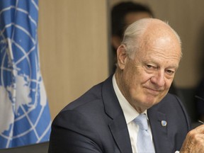 Special Envoy of the Secretary-General for Syria Staffan de Mistura attends a new round of negotiation with Syria's main opposition High Negotiations Committee (HNC) leader Nasr al-Hariri  during the Intra Syria talks, at Palais des Nations in Geneva, Switzerland, Friday, July 14, 2017. (Xu Jinquan/Pool Photo via AP)