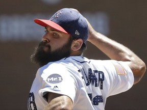 Detroit Tigers starting pitcher Michael Fulmer throws during the first inning of a baseball game against the San Francisco Giants, Tuesday, July 4, 2017, in Detroit. (AP Photo/Carlos Osorio)