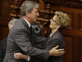 Glen Murray and Kathleen Wynne in 2014 after the swearing-in ceremony